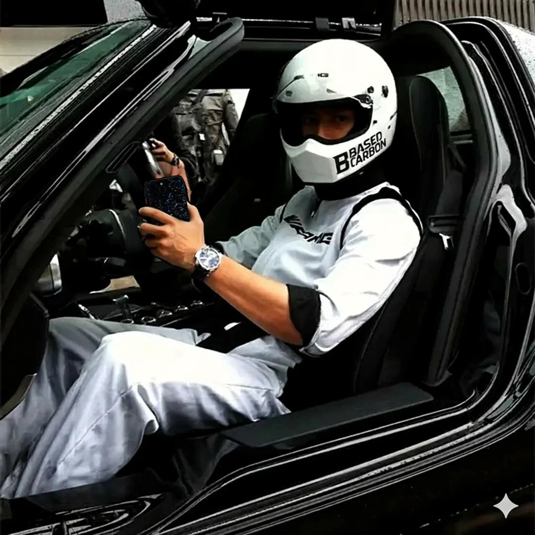 Pro racer holding BasedCarbon phone case